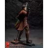Pistolet levé, drapeau brésilien en main,