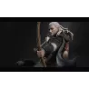 Legolas, arc tendu, et Gimli, hache en main, dans une mise en scène pleine d’intensité.