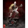 Kratos, le Fantôme de Sparte, figé dans une posture de combat spectaculaire.