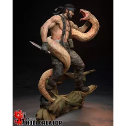 Le regard déterminé de Big Boss face au serpent géant qui l’enserre.