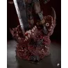 Vue rapprochée du socle démoniaque, où la Dragon Slayer transperce une masse de chairs, de dents et d’yeux surgis des ténèbres.