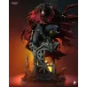 Vincent Valentine émerge des ruines du manoir Shinra, cape rouge déployée et Cerberus au poing.