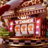 Jackpot ! La machine à sous affiche fièrement “WINNER” et aligne trois trophées.