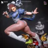 Gros plan dynamique sur le buste et le profil de Chun-Li en plein mouvement,