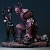 Gros plan de profil sur Morrigan canalisant sa magie face à la stature imposante du démon.