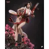 Regardez le drapé du vêtement rouge et la finesse des jambes en équilibre sur la structure.